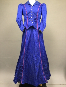 Royal Blue, Pink, Satin, Silk, Brocade, Victorian, Notched Lapel, Puffed Shoulder Caps with Horsehair Structure, Seven Button Front with Mosaic Shell Deco Buttons, Snap Rigged and Hook and Eye Closure Front, Pink Piping at Princess Seams, Two Matching Buttons at Side Back Waist. 
